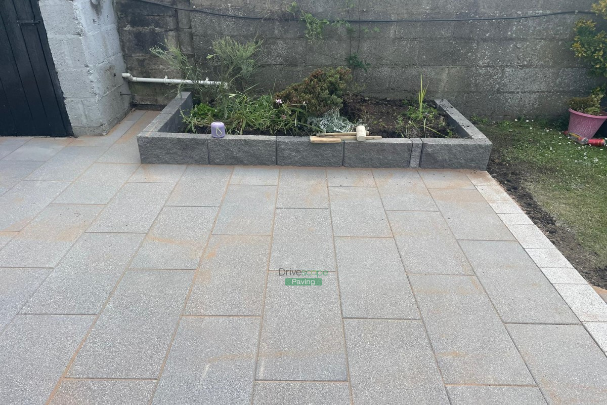 Patio with Black Granite Slabs and Lismore Border in Santry, Dublin ...